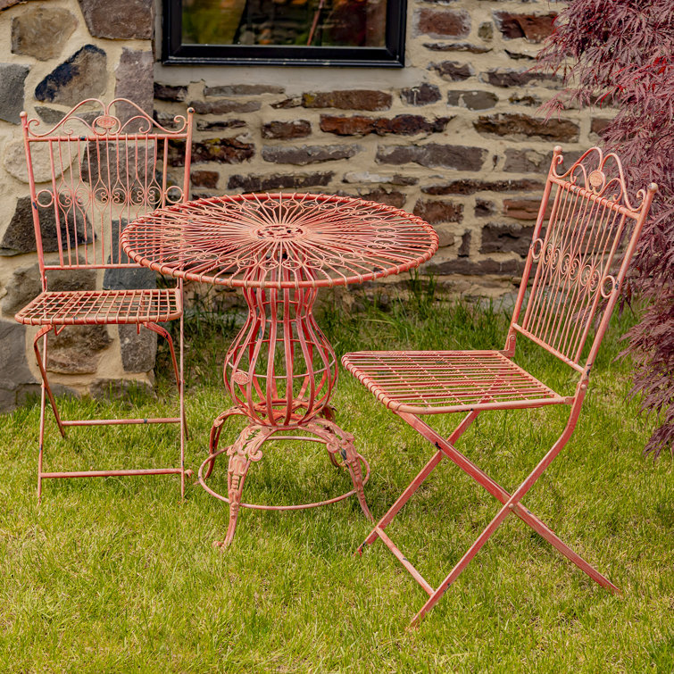 Red metal bistro table best sale and chairs